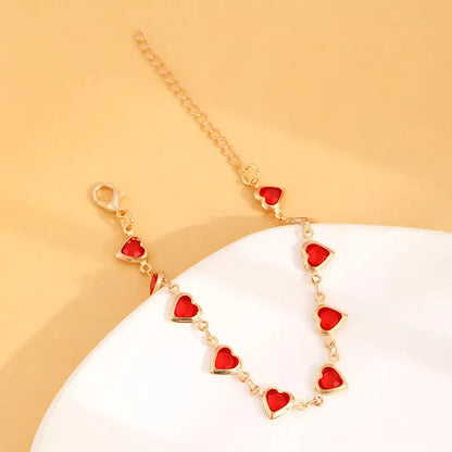 Gold Rubin Herz Chain Armband